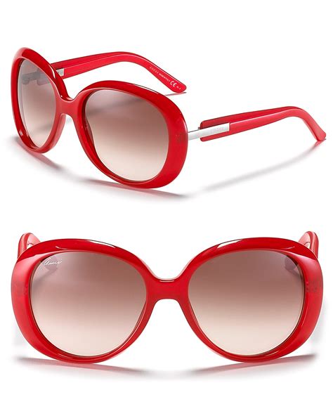 oversized red sunglasses.